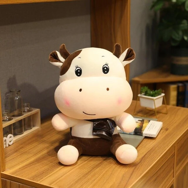 Simpatici peluche di mucca di diverse dimensioni